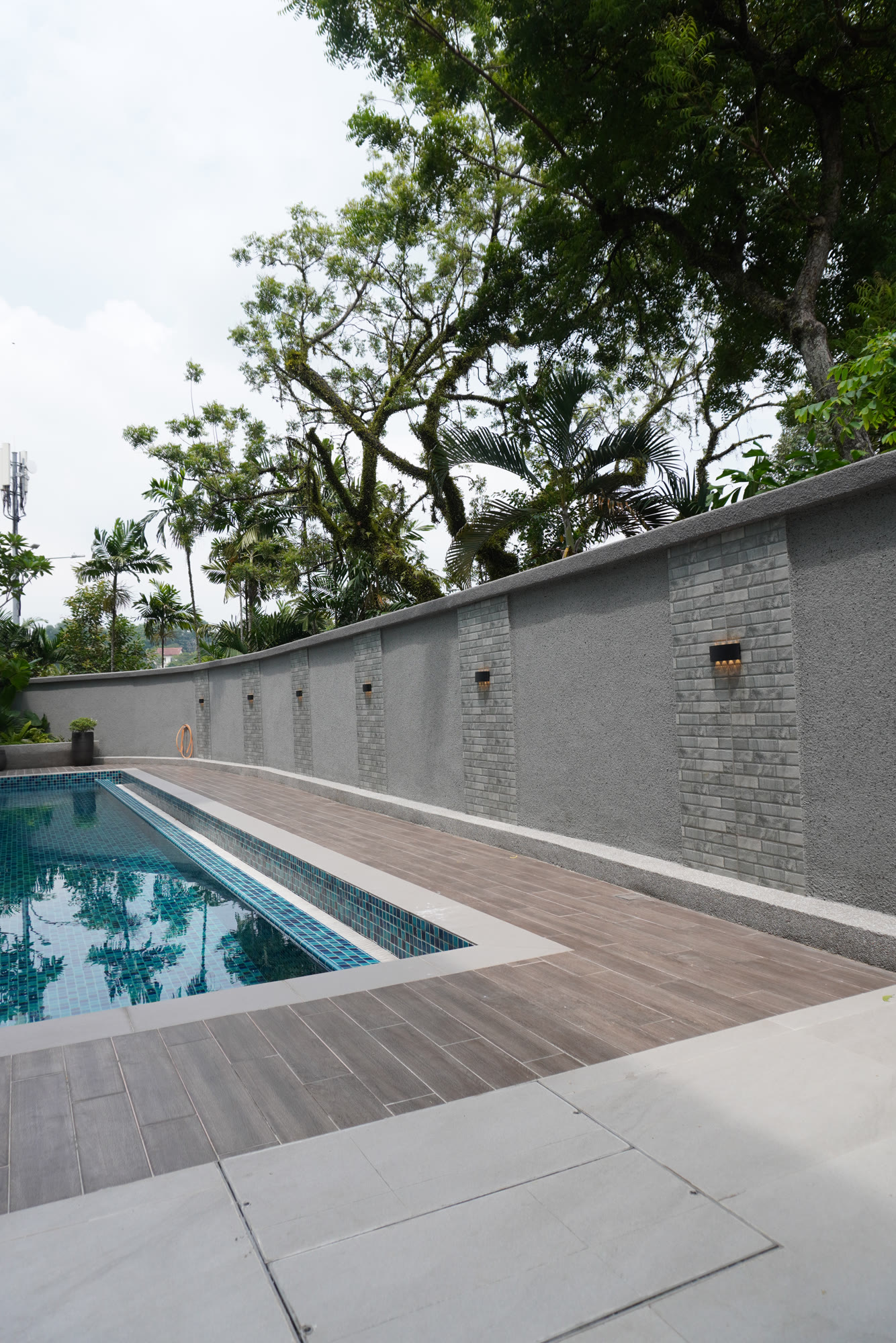 Poolside detail from a completed Walltery residence